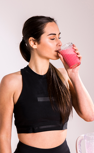 person drinking smoothie